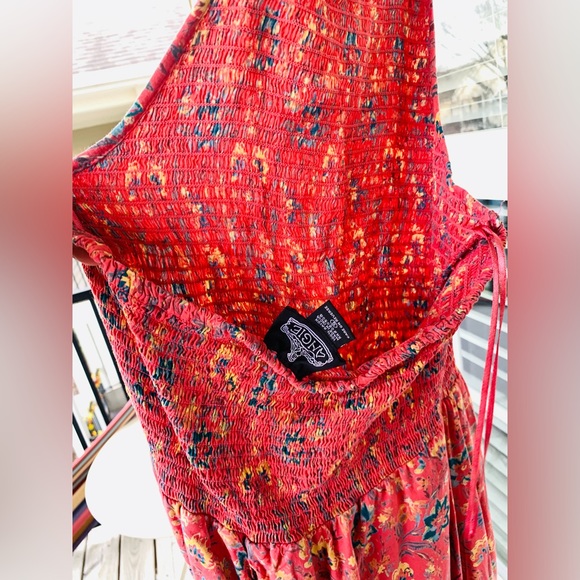 Floral Split front romper with attached shorts and smock halter top. - Picture 7 of 13